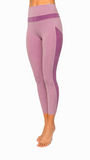 Purple leggings with a contrasting band on a white background